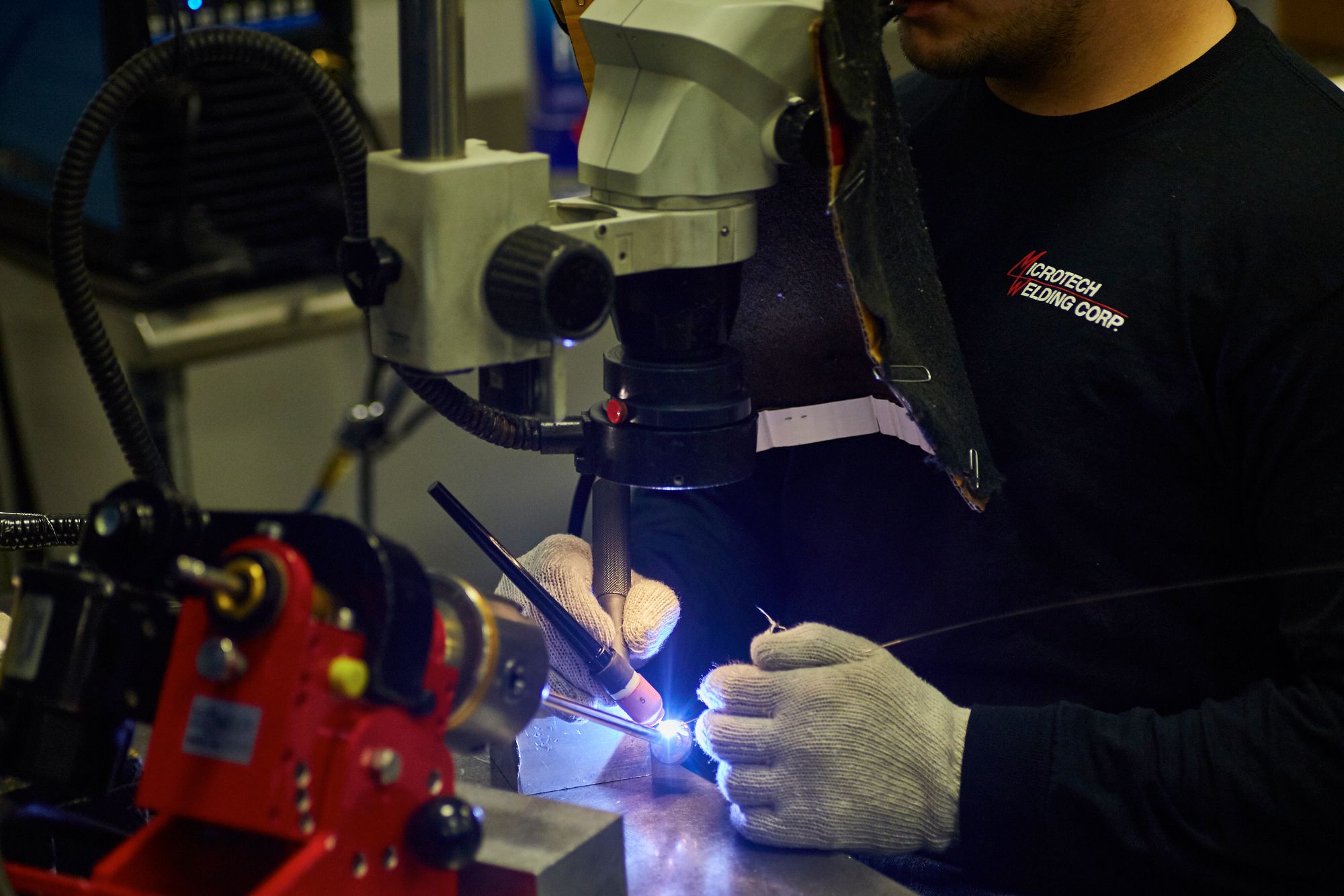 Welder performs intricate micro weld on a small part