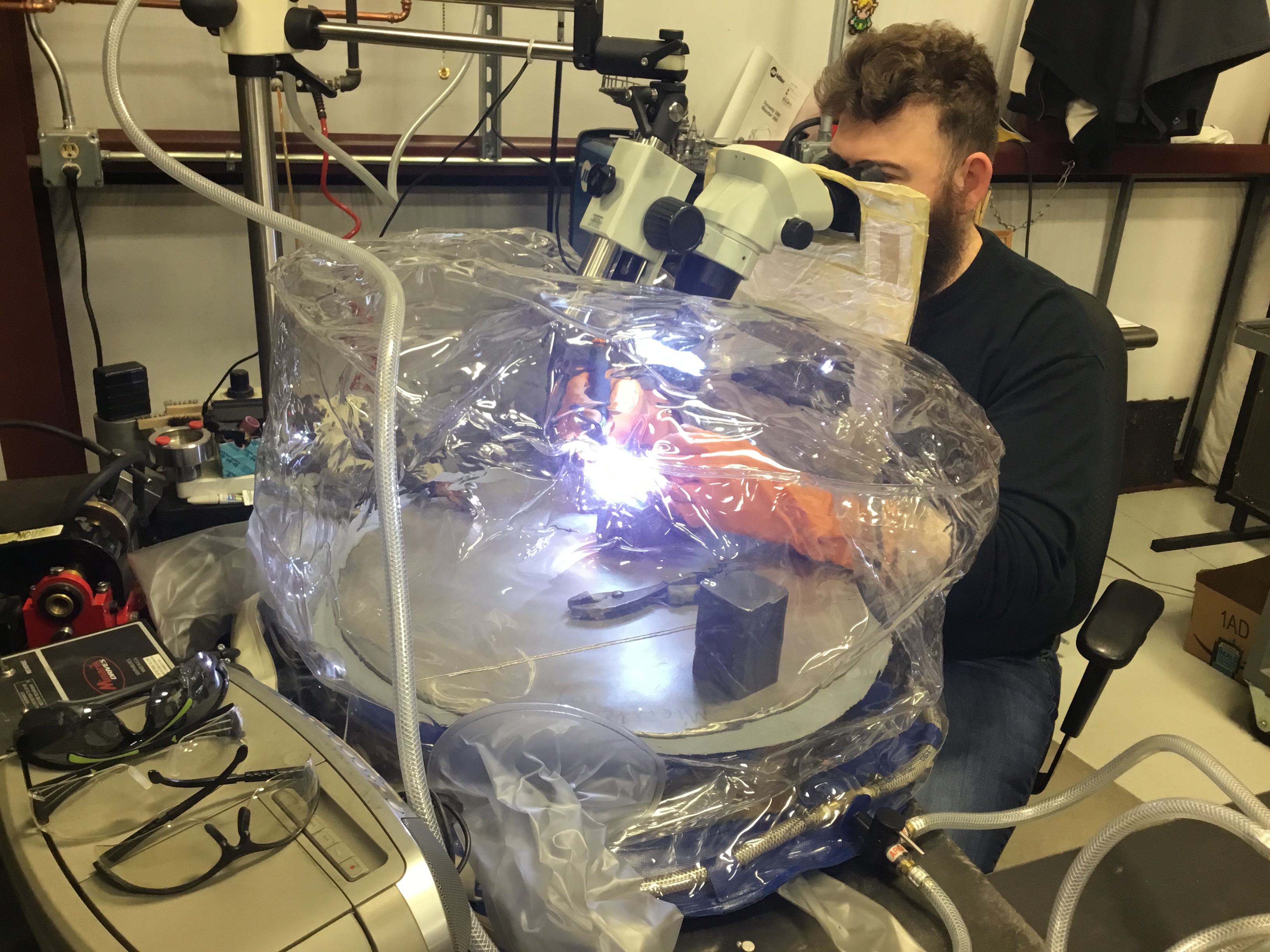 Microtech' welder working at the purge chamber