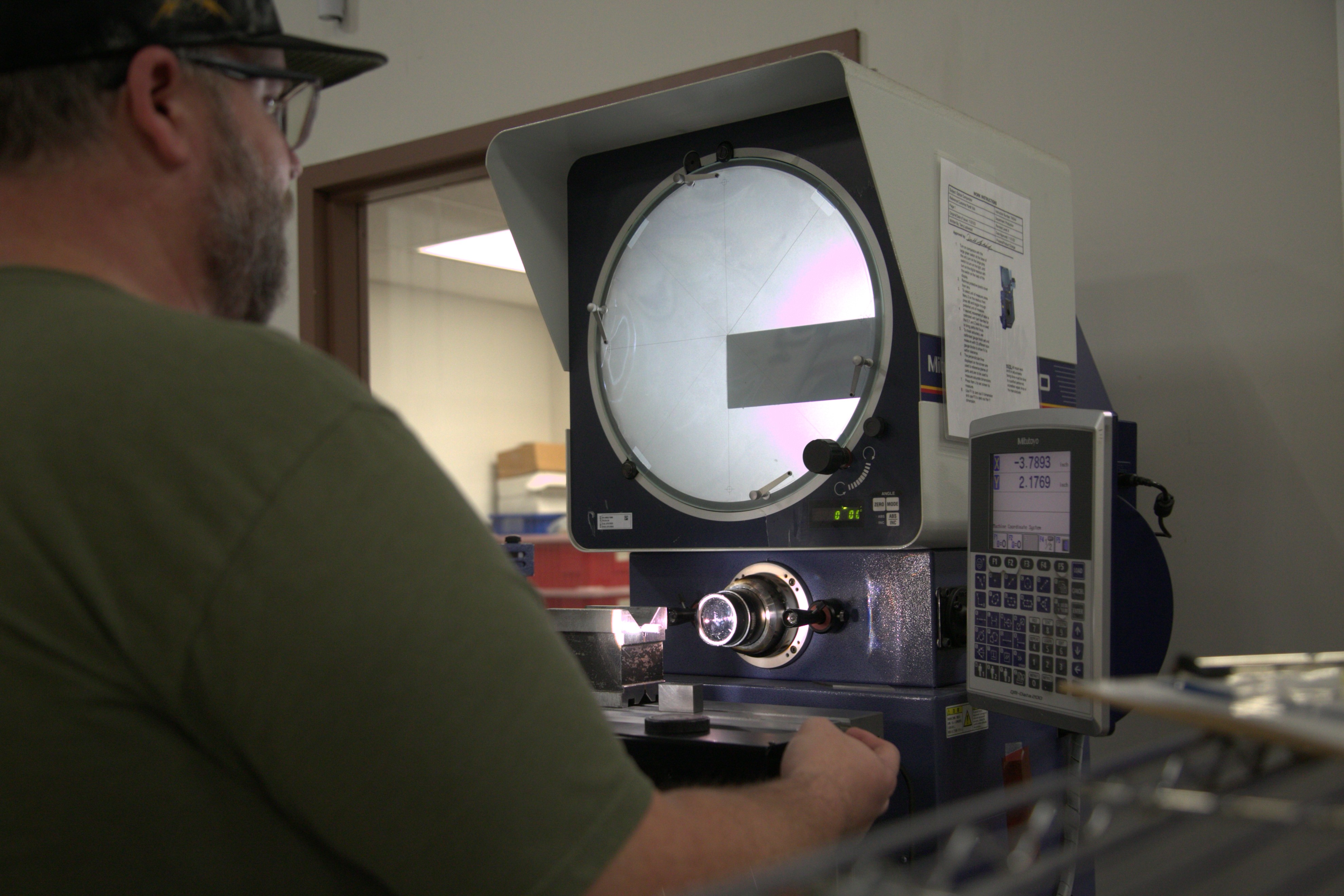 Microtech's employee working with an inspection tool